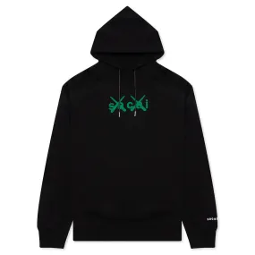 Sacai x Kaws Flock Print Hoodie - Black/Green